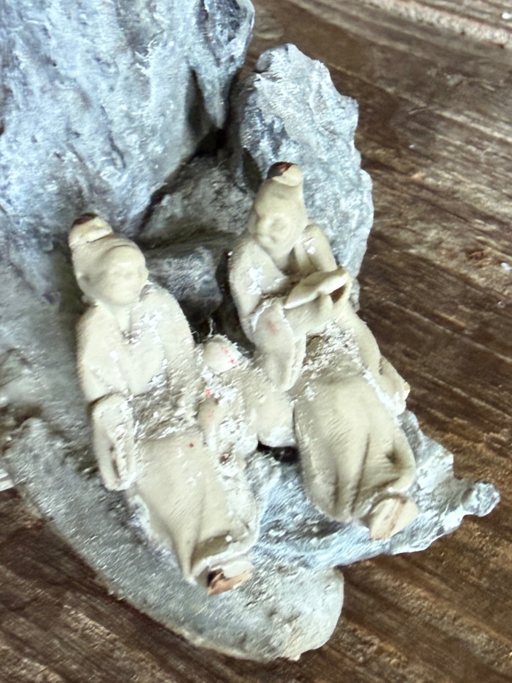Decorative Figurine of traditional Chinese Mudmen on rocks